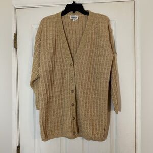 Beautiful sweater with a gold glitter to it. Tag says 14 but see measurements.